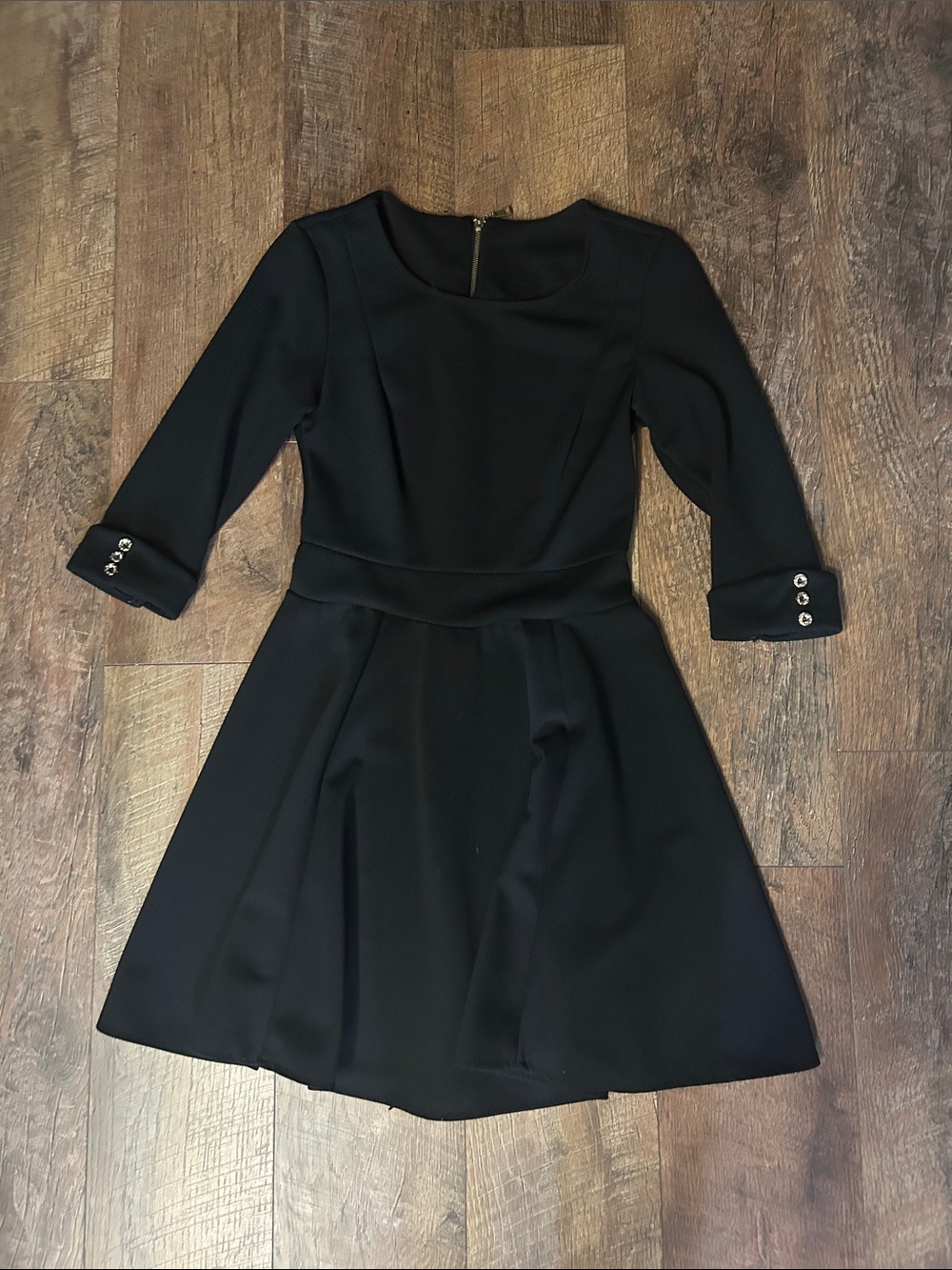 Classic Black Fit-and-Flare Dress with Button Cuffs